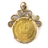 A George III 1804 gold 1/3 guinea coin in a 9ct yellow gold mount, L. 3cm.