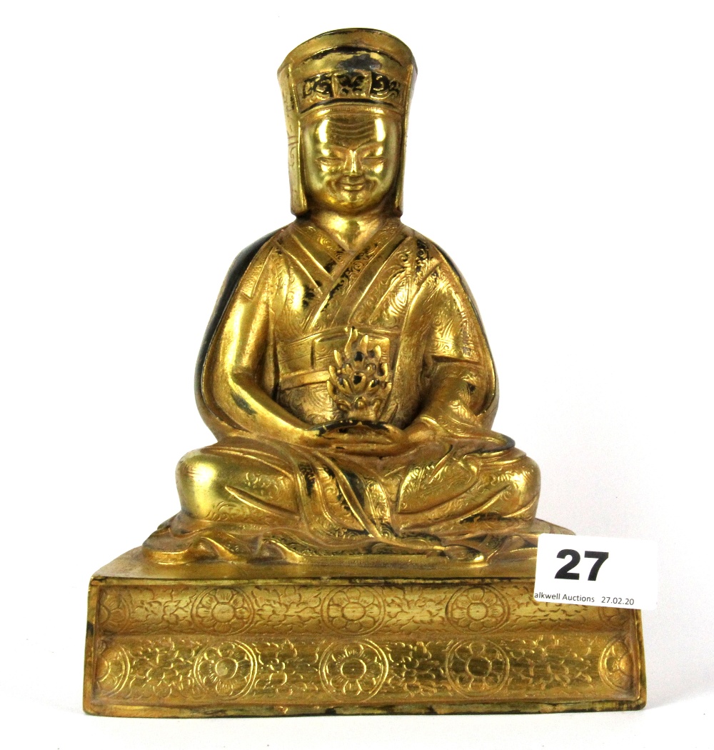 A Tibetan gilt bronze figure of a seated Lama, H. 20cm. - Image 3 of 3