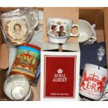 A box of mixed commemorative items