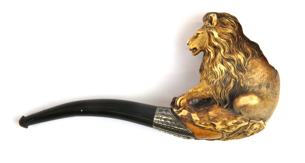A superb white metal mounted Meerschaum lion tobacco pipe, bowl H. 9cm, pipe L. 17cm.