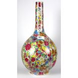 A Chinese hand painted porcelain vase with thousand flowers decoration, H. 41cm.