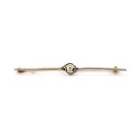 A boxed 15ct yellow and white gold (stamped 15ct) diamond set bar brooch, L. 5.5cm.