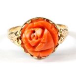 A 15ct rose gold (stamped 15 and marked 583) carved coral rose shaped ring, (P).