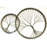 Two interesting bicycle wheel wall sculptures, largest Dia. 52cm.