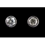 A pair of 9ct white gold (stamped 375) stud earrings set with brilliant cut diamonds, approx. 0.40ct