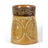 A Royal Doulton silicon Queen Victoria Diamond Jubilee commemorative mug, H. 10cm, (A/F to handle).