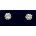 A pair of 18ct white gold stud earrings set with brilliant cut diamonds, approx. 1.3ct overall.