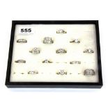 A tray containing 13 silver stone set rings.