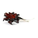 An unusual 925 silver and reconstituted amber orchid brooch, L. 8cm.
