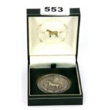 A hallmarked silver Welsh Pony & Cob society medal.