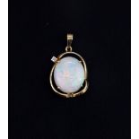 A 9ct yellow gold opal and diamond set pendant, L. 2.5cm.