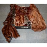 A quantity of vintage fur coats and jackets.