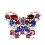A 925 silver butterfly shaped brooch set with sapphires, rubies, amethyst and fire opals, L. 3cm.