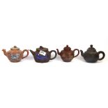 A group of four Chinese Yixing terracotta teapots, H. 9cm.