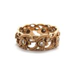 A boxed 14ct rose gold (stamped 14k) diamond set "The Welsh Gold Full Eternity Ring" by Stuart