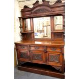 A large Victorian mahogany chiffonier sideboard, W. 154cm H. 227cm.