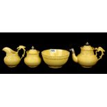 A rare 18th Century creamware relief decorated tea set with elaborate silver-work repairs, teapot H.