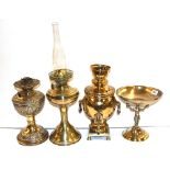 Two brass oil lamps, samovar and comport.