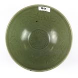 A Chinese incised celadon glazed porcelain bowl, Dia. 21cm, H. 9cm.