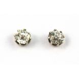 A pair of 18ct yellow and white gold stud earrings set with old cut diamonds, approx. 0.50ct
