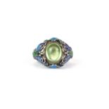 A Chinese 925 silver enamelled and stone set ring (adjustable size), top W. 1.8cm.
