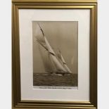 Three gilt framed re-printed photographs of early 20th century yacht racing, from the originals in