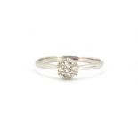 A 9ct white gold diamond set cluster ring, (M.5).