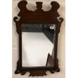 A Regency wall mirror, W. 49cm H. 74cm.