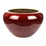 A Chinese sang de boef glazed porcelain bowl, H. 34cm, Dia. 24cm.