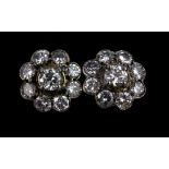 A pair of 18ct white gold (stamped 750) diamond set cluster earrings, dia. 1cm, approx. 1.1ct