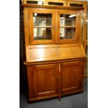 A 19th century Biedermeier fruitwood bureau cabinet, 128 x 190cm.