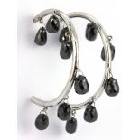 A pair of 18ct white gold (stamped 750) earrings set with briolette cut black diamonds, approx.