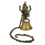 A 19th Century Nepalese Ganesh bronze temple bell on chain, bell H. 30cm, overall H. 127cm.