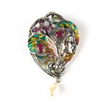A 925 silver Art Nouveau style brooch decorated with champlevé enamel, set with two rubies and a