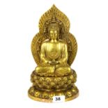 A gilt bronze figure of the seated Buddha, H. 18cm.