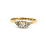 An 18ct yellow gold and platinum diamond set solitaire ring, approx. 0.4ct, (U).