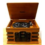 A Steepletone reproduction record player, radio, CD and tape player, 37 x 38 x 26cm.