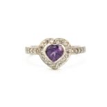 A 9ct white gold heart shaped cluster ring set with heart cut amethyst surrounded by brilliant cut