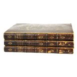 Three half leather bound volumes of 'Master Humphrey's Clock' by Charles Dickens 1840, Loose cover