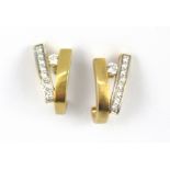 A pair of 18ct yellow gold diamond set earrings, L. 1.3cm.