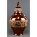 A large signed lustre glazed Studio pottery jar and lid, H. 47cm, (small repair to lid).