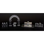 A boxed Swarovski crystal three part model of a palace with an arch and other items, one tree A/F.