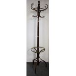 A wood and metal hat stand.