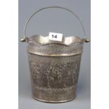 A Continental silvered hammered copper ice bucket, H. 22cm.