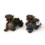 A pair of Chinese carved jade/ hardstone dragon figures, L. 14cm H. 10.5cm.