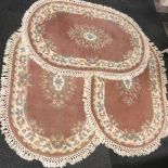 Three matching Indian wool rugs, largest size 135 x 88cm.