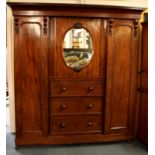 A 19th century carved mahogany compactum, W. 198cm.