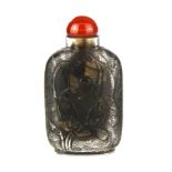 A Chinese carved rock crystal snuff bottle decorated with catfish and with polished cornelian