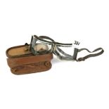 A pair of vintage L' Express Brevet folding goggles.