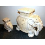 A porcelain elephant stool and baby elephant, H. 45cm.